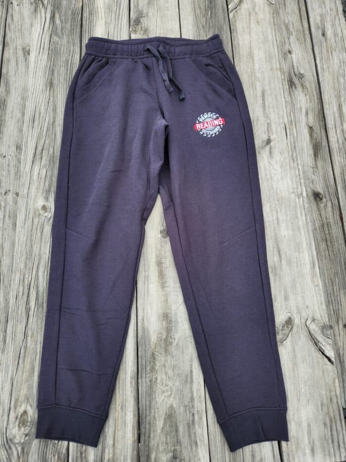 black sweatpants with emroidered tire logo